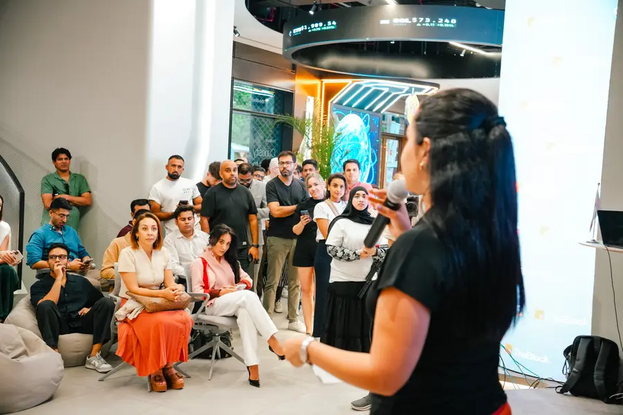 TheBlock's team welcoming the room at the AI After Hours opening night.